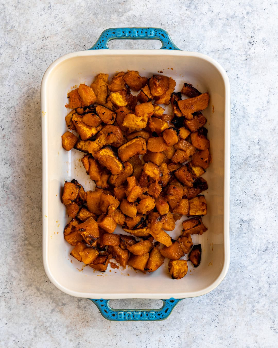 Baking butternut squash cut into cubes