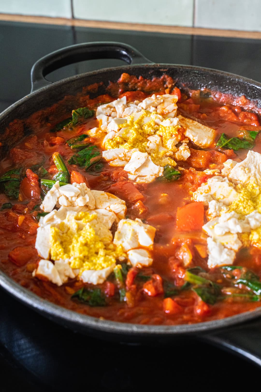 Adding the silken tofu in shape of poached eggs.