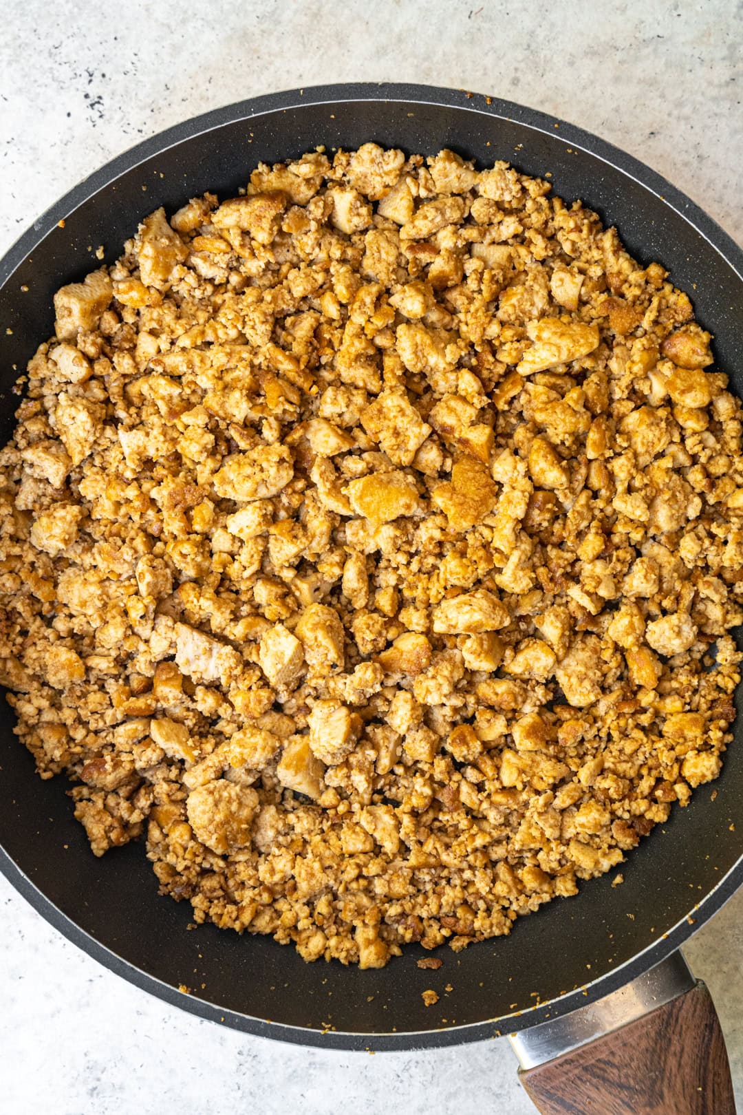 Cooking marinated tofu in a pan