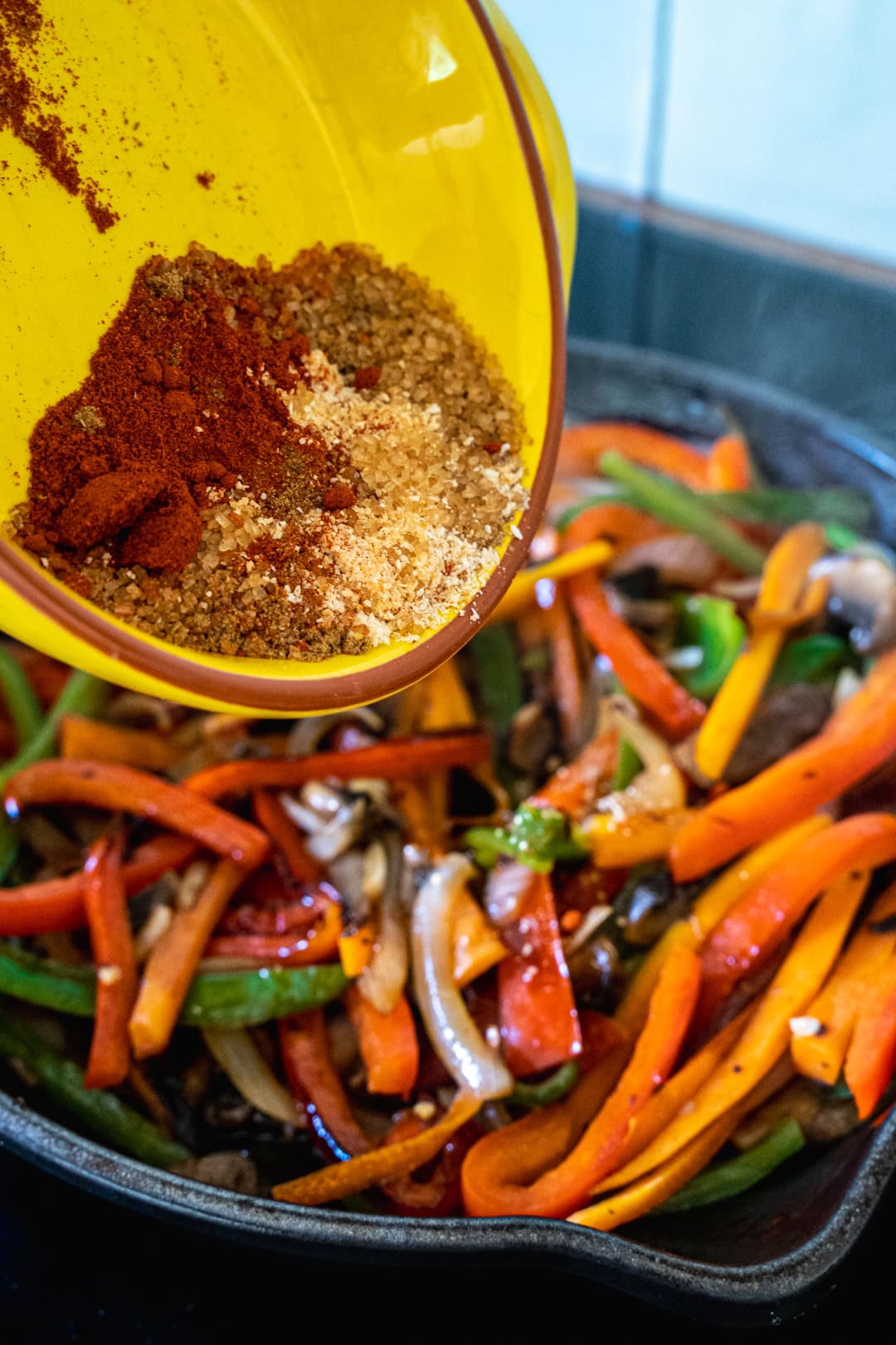 Adding the homemade fajita seasoning. 