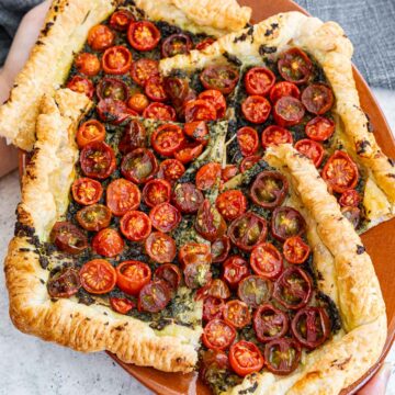 Roasted Cherry Tomato Tart on a clay plate