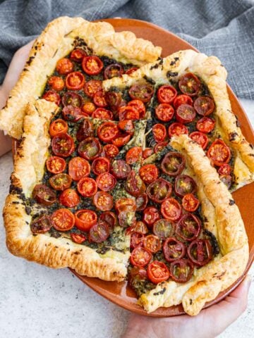 Roasted Cherry Tomato Tart on a clay plate