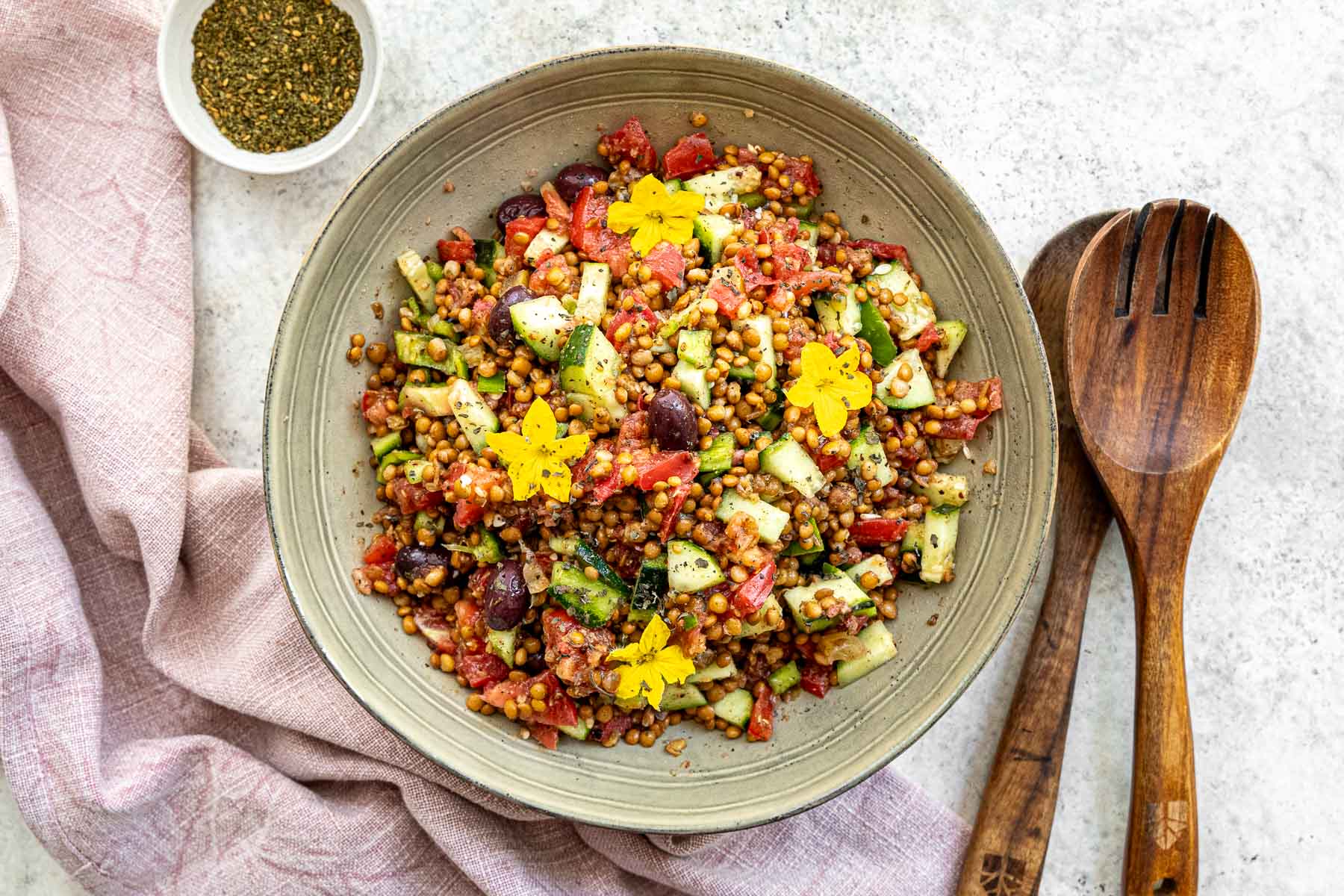 Lentil salad with cucumber flowers